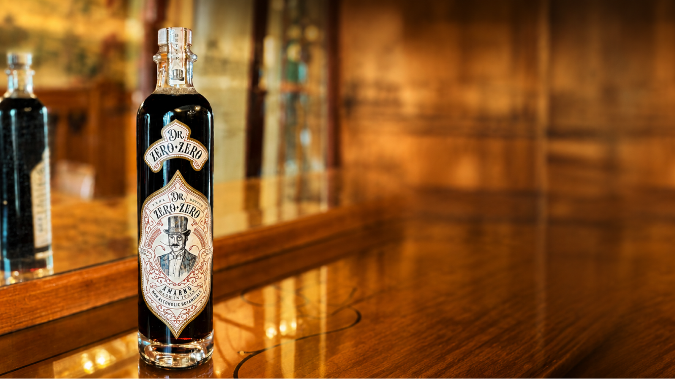 Bottle of Hennessy Cognac on a wooden bar with blurred background